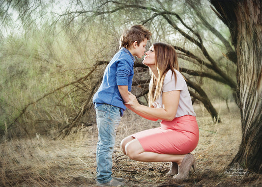 Son kissing mom