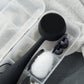 4003-Case?PMD Clean Body Case on towel with black PMD Clean Body and accessories inside