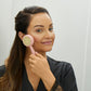 4002-RoseG? Woman cleansing with the PMD Clean Pro Gold