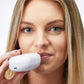3102?Woman using PMD Kiss with kissfoliator attachment